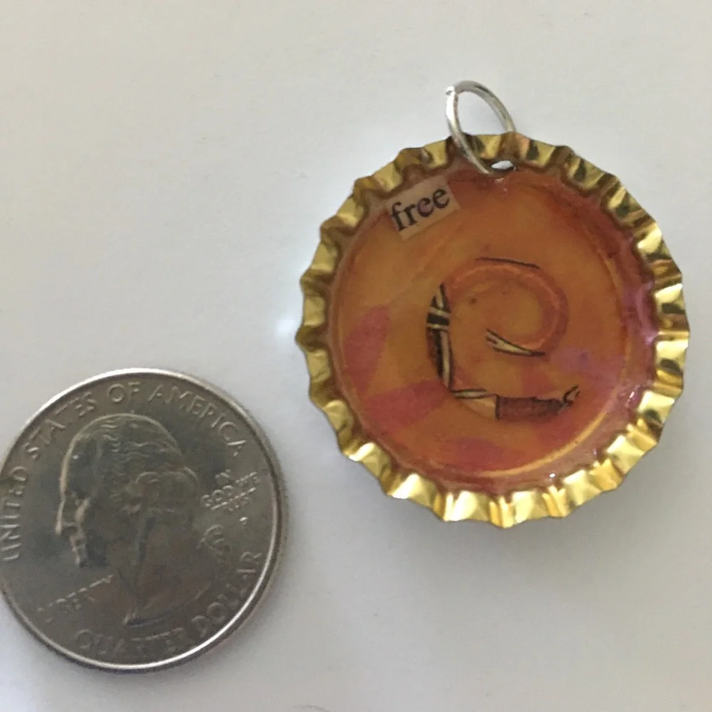 One of a kind hand crafted bottle‎ cap pendant